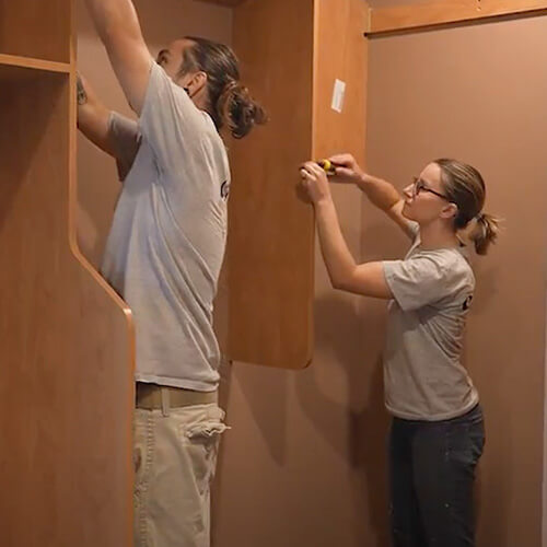 Trevor and Kaylee installing a closet