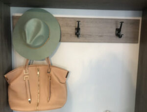 Hang bar and hooks with hat and bag