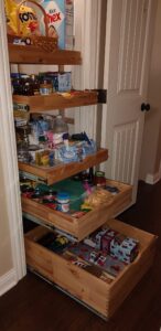 Slide Out Shelves in Pantry with Various Sizes of Drawers