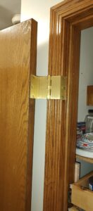 swing clear hinges, custom pantry storage, functional pantry, slide out shelves
