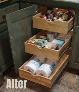 After trash compactor cabinet transformation with custom pull-out shelves
